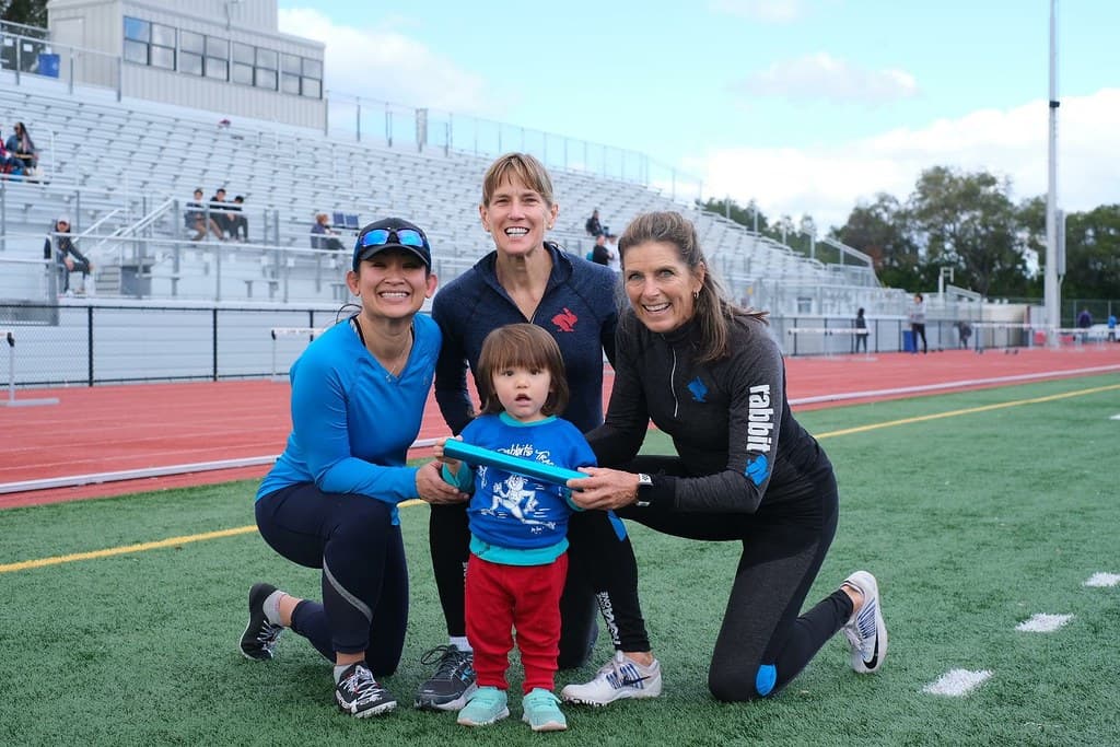 Joy Upshaw with young athletes