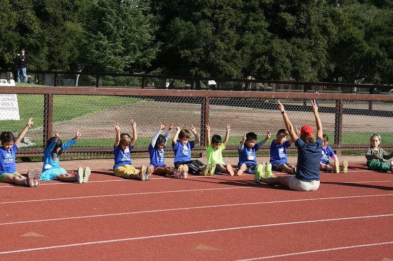 Young athletes at hurdles on the track