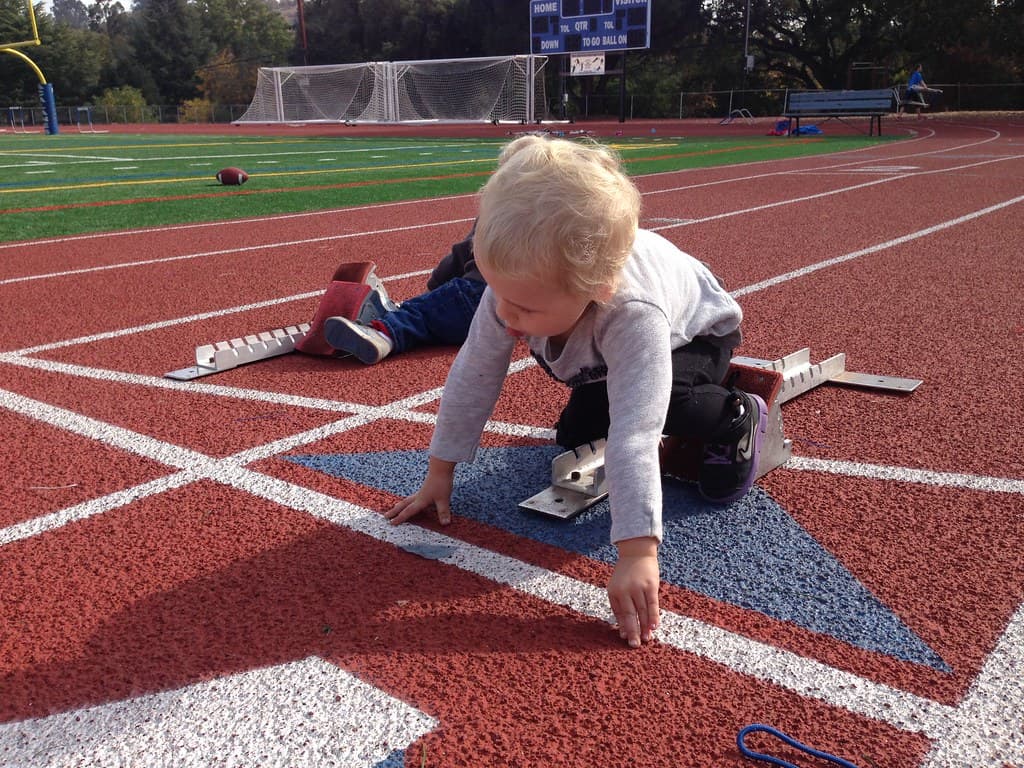 Young athlete at the starting line